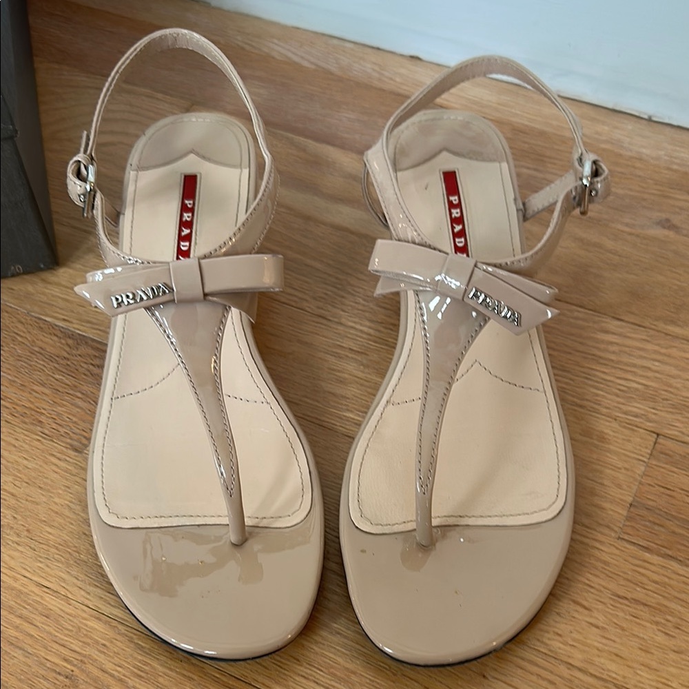 Prada Cream T-Strap Sandals with Buckle Closure